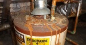 top of rusty old water heater